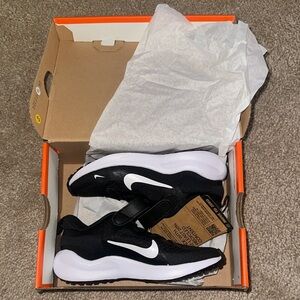 Kids Nike Dual-Tone Black and White Athletic Shoes